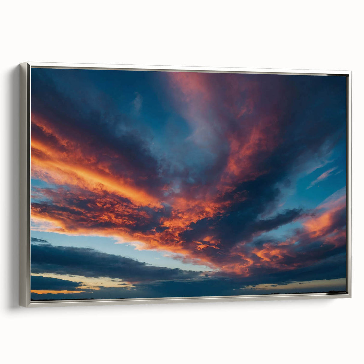 Framed wall art showcasing a stunning landscape with vibrant colors and intricate details, featuring a silver frame and side view, perfect for modern decor.