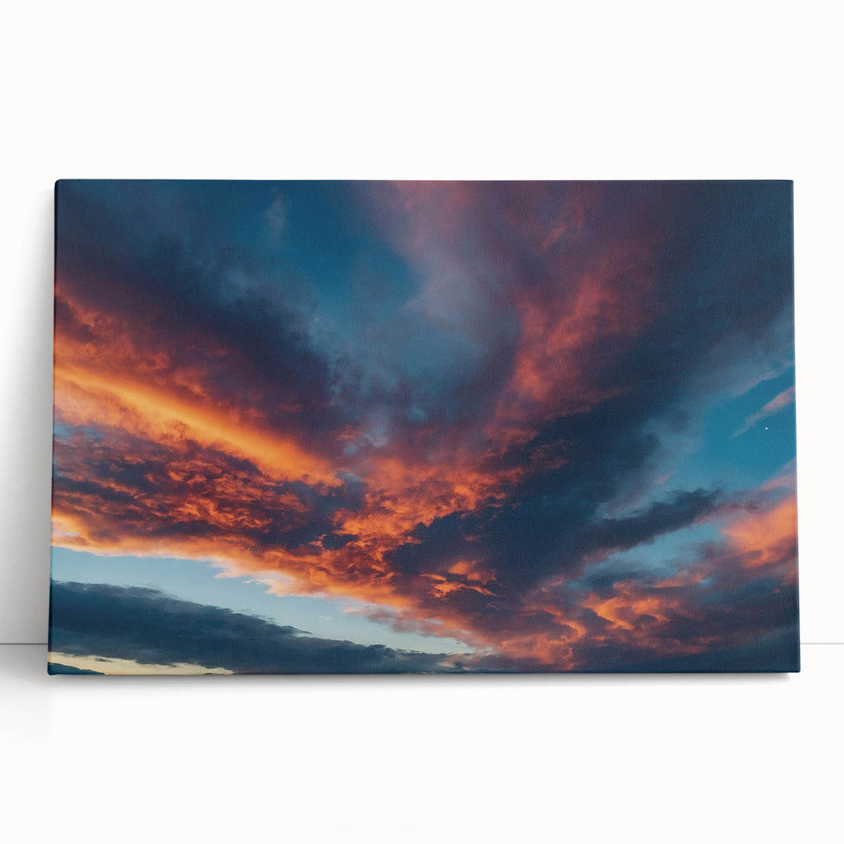 Stretched canvas wall art showcasing a vibrant landscape and skyscape design, featuring vivid colors and intricate details, perfect for enhancing home decor.