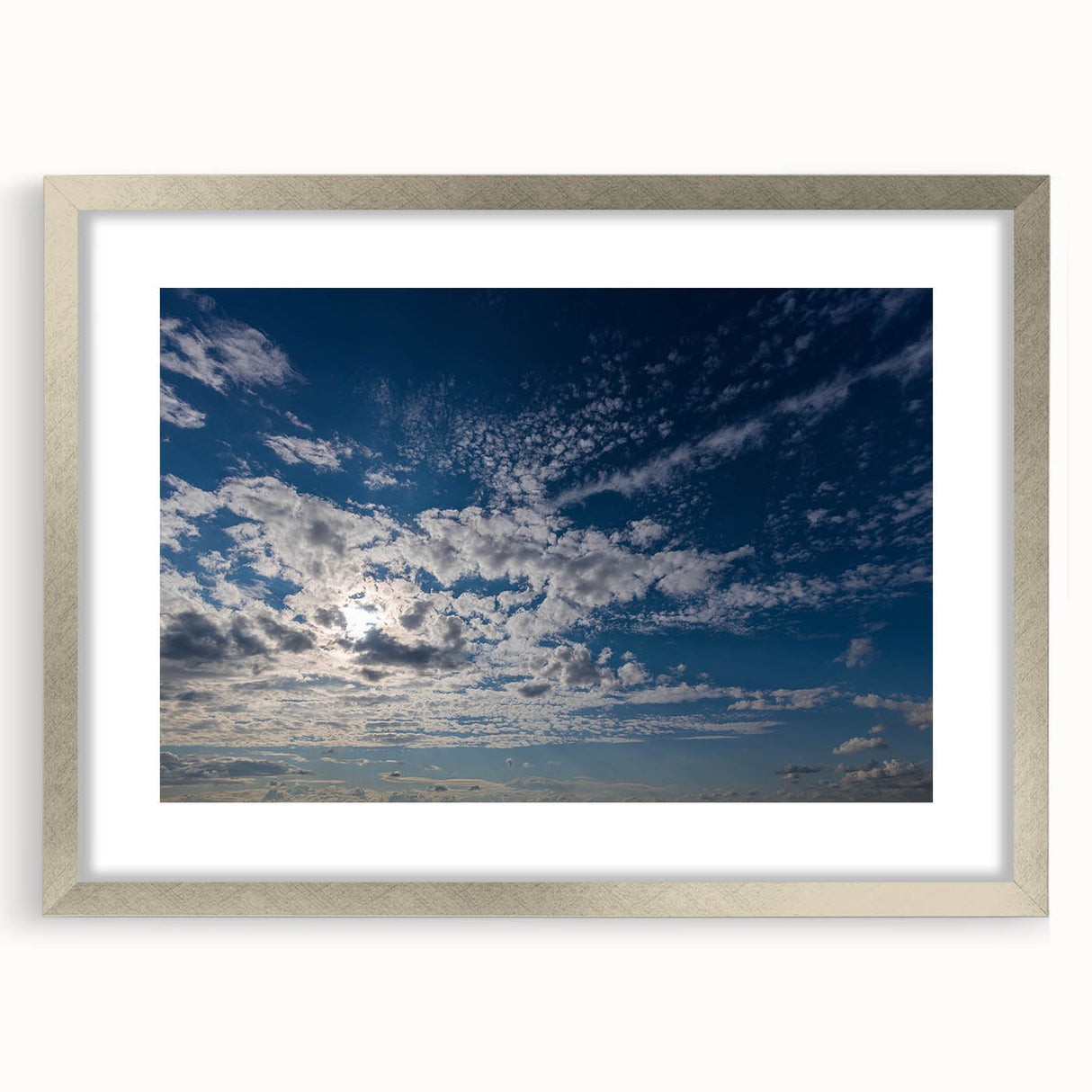 Framed wall art from the Landscapes Skyscapes collection, showcasing a stunning silver mat. The piece features serene natural imagery, perfect for enhancing home decor.
