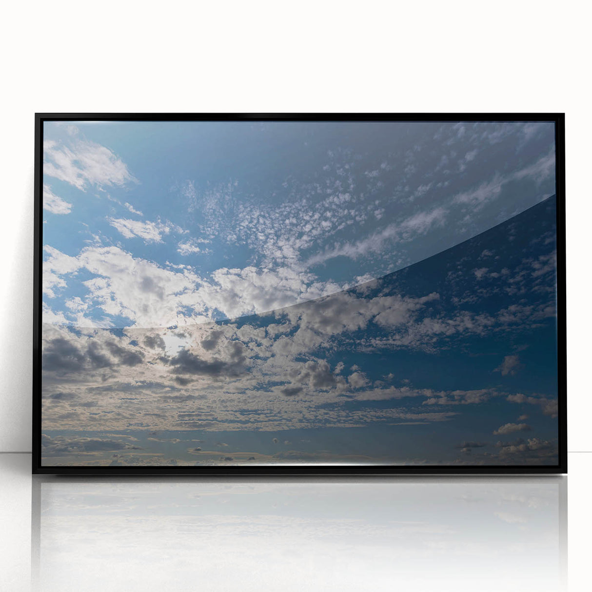 Framed acrylic wall art featuring a serene landscape with vibrant colors and intricate details, showcasing a black frame that enhances the visual appeal, perfect for home decor.