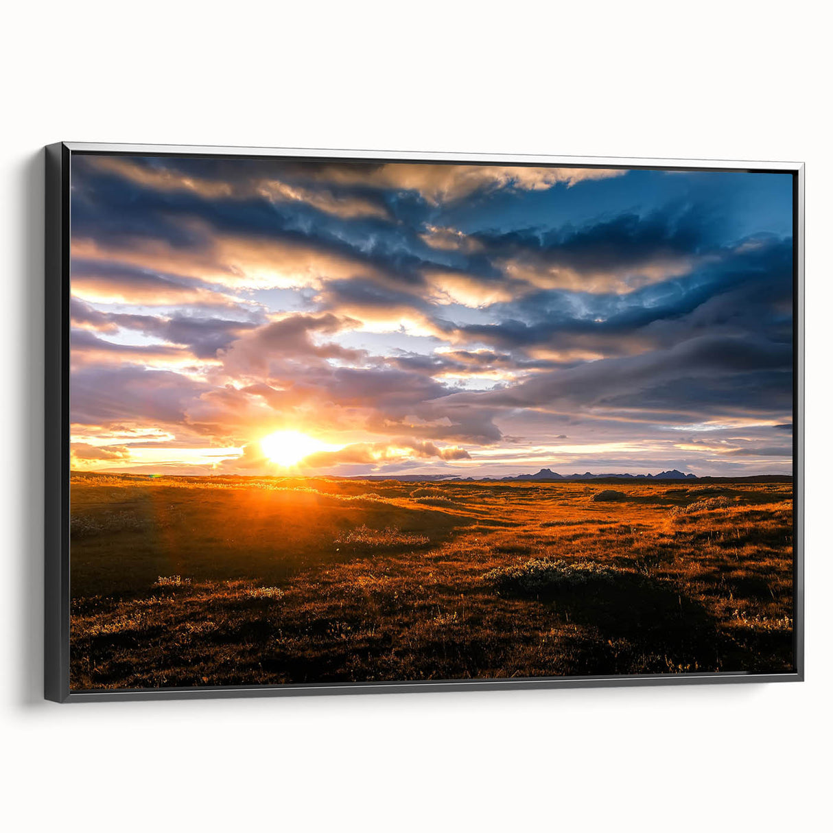 Framed landscape wall art collection showcasing a serene skyscape with vibrant hues, displayed from a black side view to highlight depth and elegance.