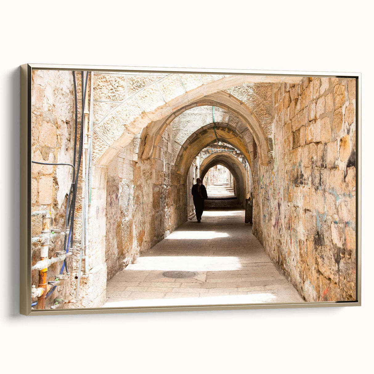 Framed canvas wall art showcasing a vibrant landscape design with gold accents, elegantly displayed from the side to highlight its artistic details and texture.