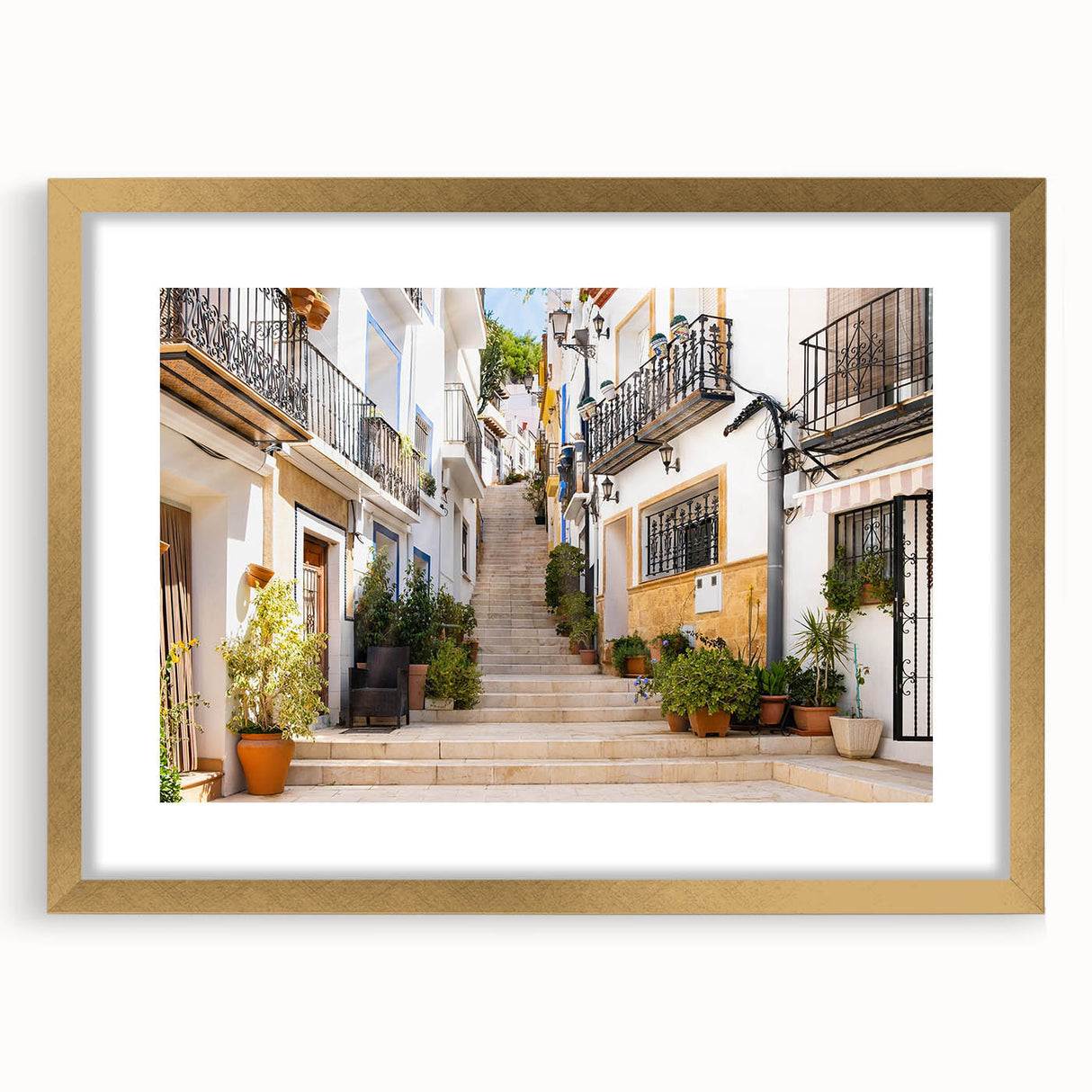 Elegant framed wall art featuring a serene landscape design with vibrant colors, set in a gold frame with a mat, perfect for enhancing home decor.