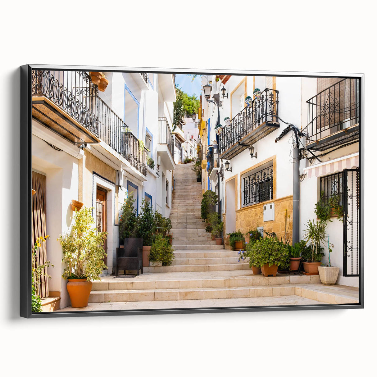 Framed black canvas wall art showcasing a vibrant street landscape design, ideal for modern home decor, emphasizing urban aesthetics and contemporary style.