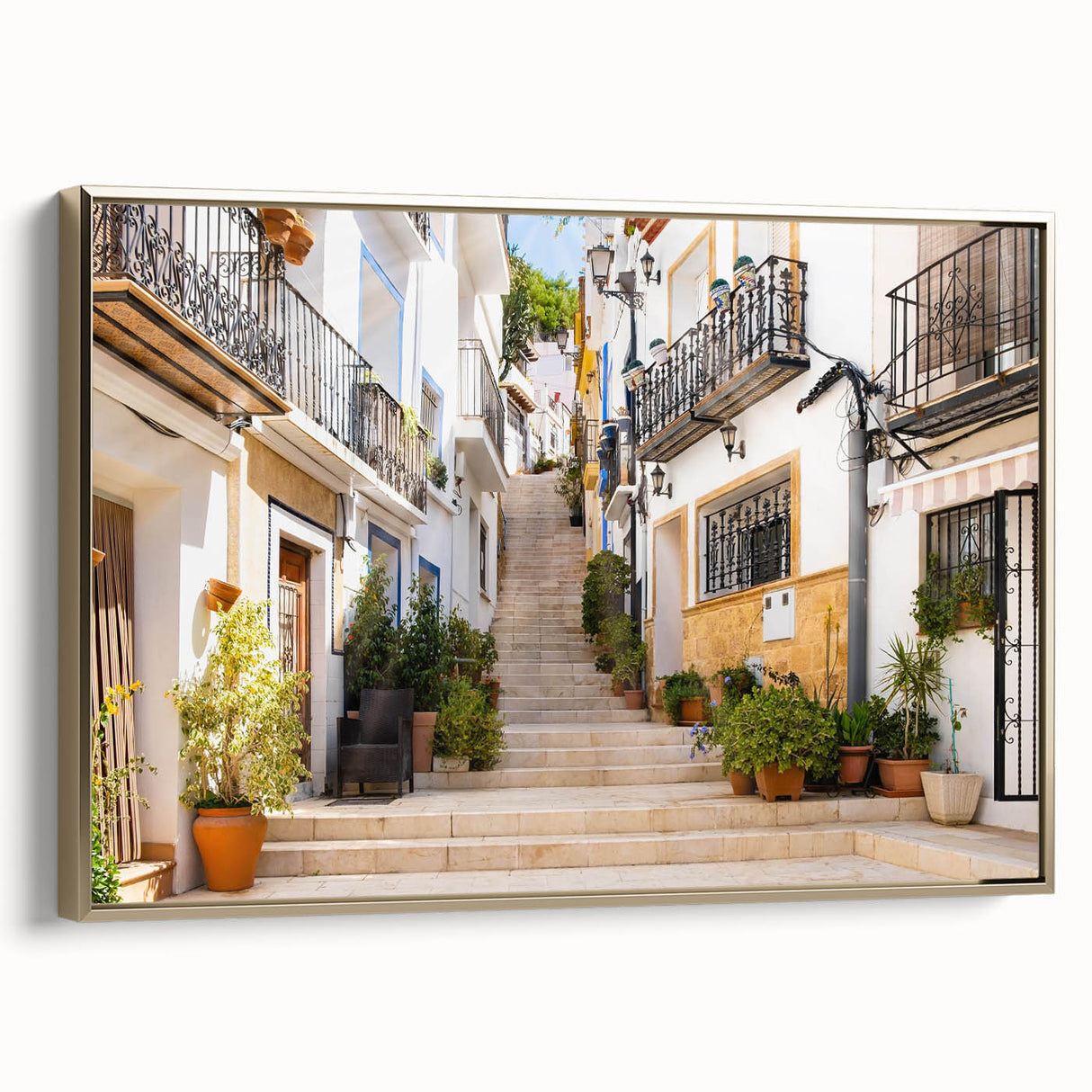 Framed canvas wall art featuring a modern landscape design with vibrant colors and gold accents, showcased from a side view, perfect for home decor.