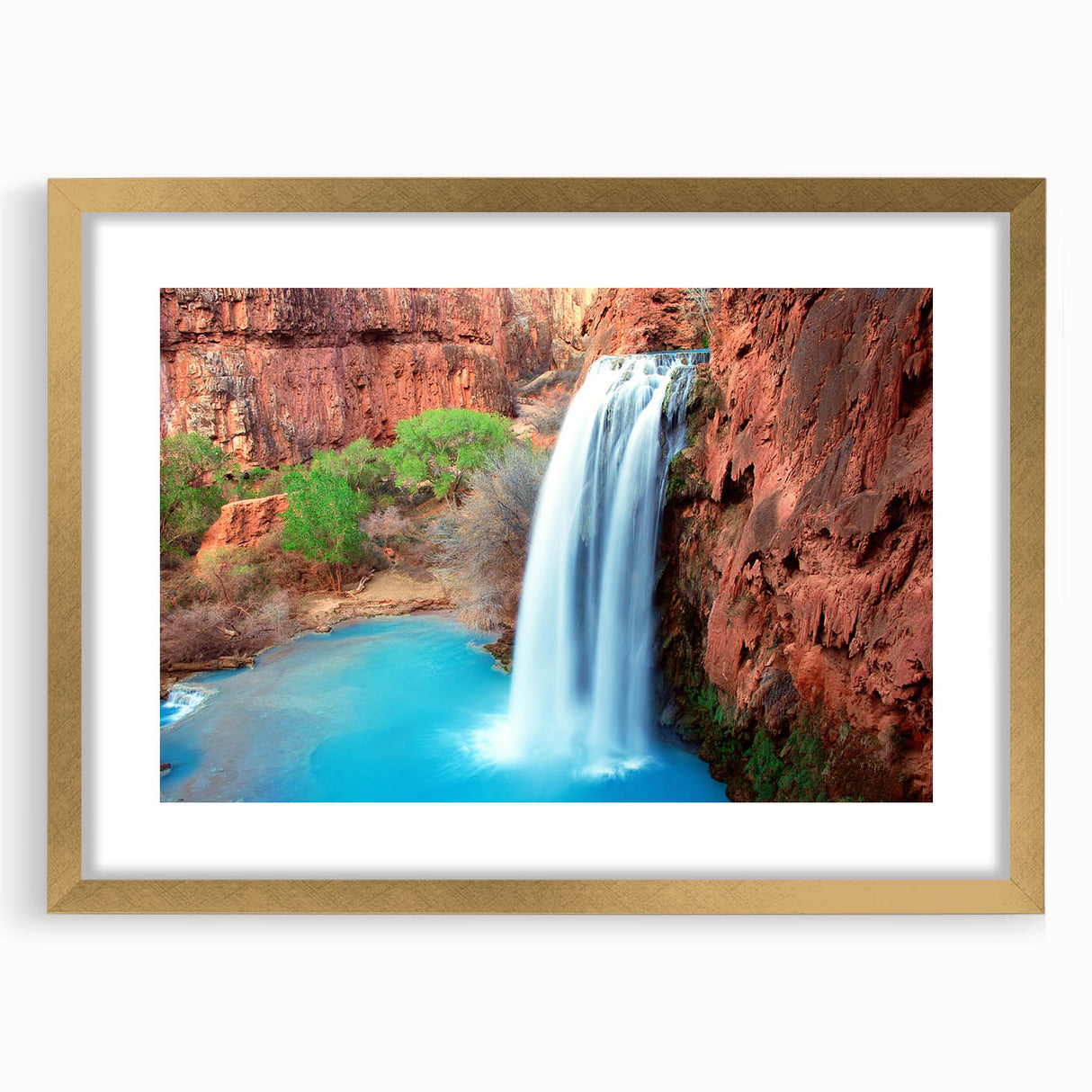 Framed wall art featuring a stunning waterfall landscape design, elegantly bordered with a gold frame and mat, perfect for home decor enhancement.