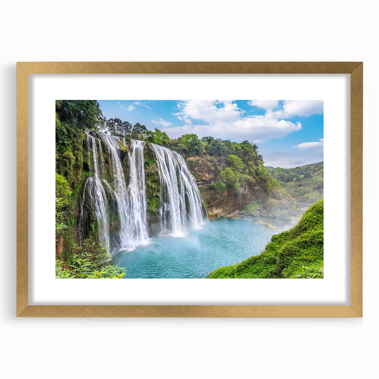 Framed wall art collection showcasing a serene waterfall landscape, featuring a gold mat and frame, perfect for enhancing home decor with natural beauty.