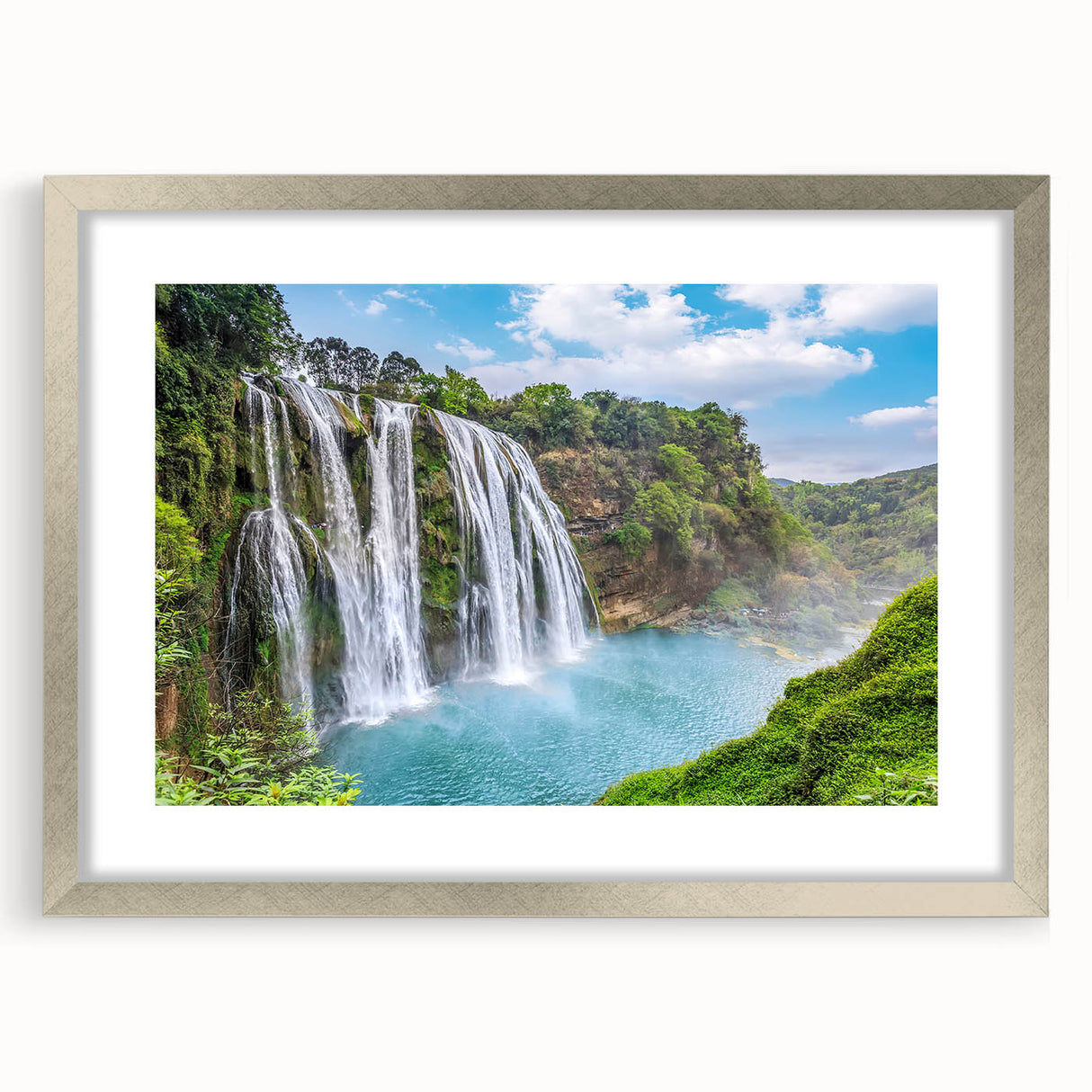 Framed wall art collection showcasing a serene waterfall landscape design with a silver mat, perfect for enhancing home decor and creating a tranquil atmosphere.