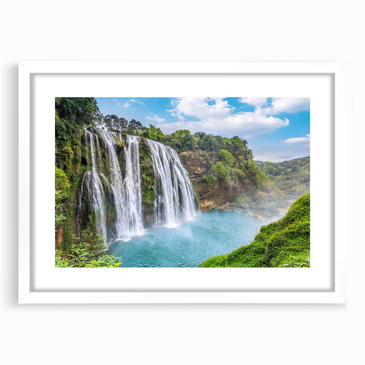 Framed wall art collection showcasing a serene waterfall landscape design, featuring a white mat and elegant frame, perfect for home decor or office ambiance.