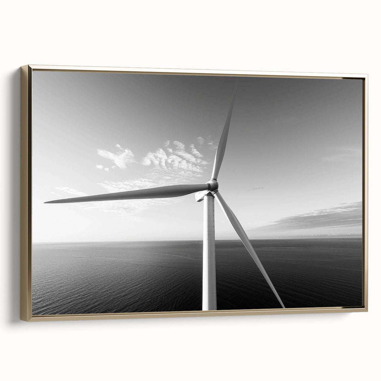 Framed canvas wall art showcasing a serene landscape with windmills, accented by a gold frame, perfect for enhancing home decor with a touch of elegance.