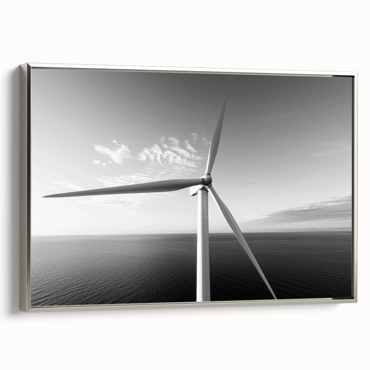 Framed canvas wall art showcasing a serene landscape with windmills, featuring a silver frame and vibrant colors, perfect for home or office decor.