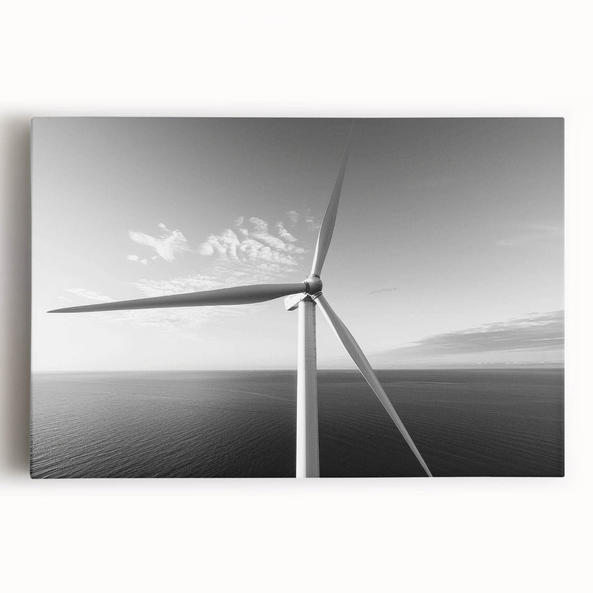 Stretched canvas wall art showcasing a serene landscape with windmills under a vibrant sunset, ideal for home decor. Perfect for adding tranquility to any room.