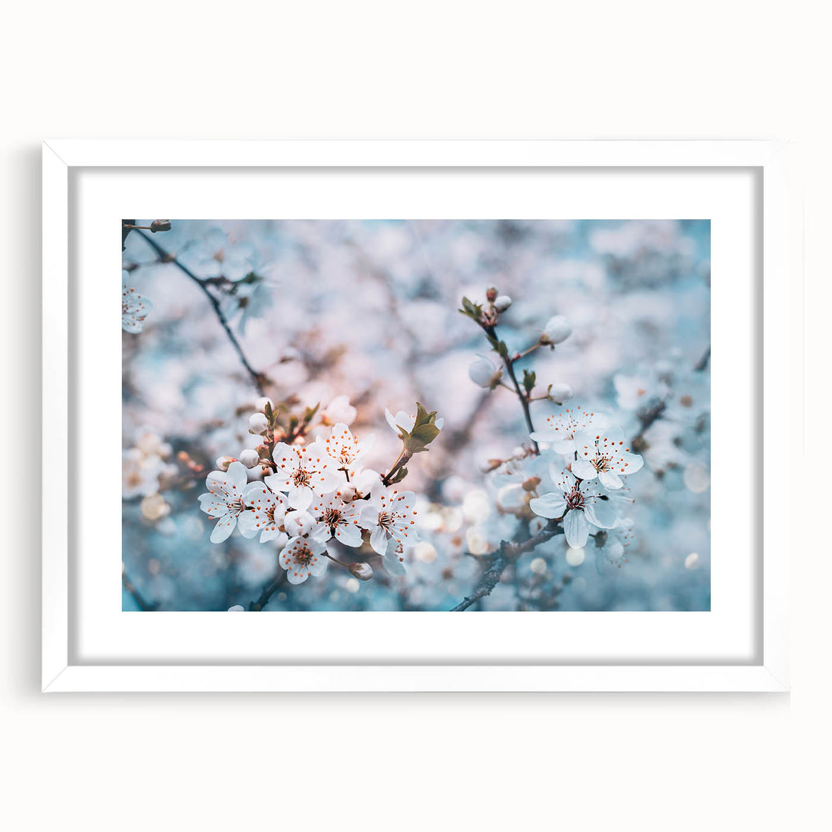 Abstract art print of floral designs in soft pastel shades on a white-framed canvas.