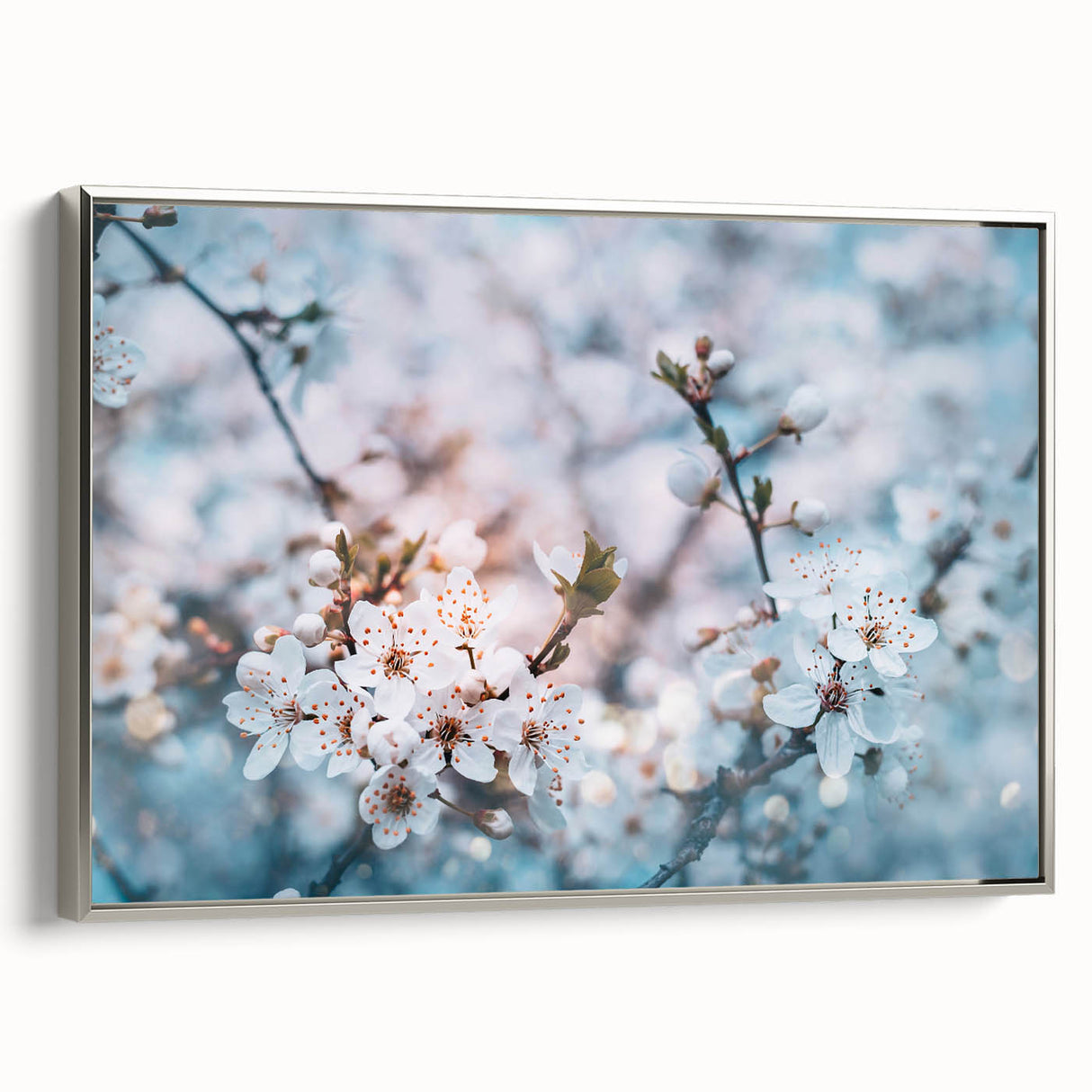 Framed canvas featuring a vintage landscape art painting with vibrant colorful flowers against a black background.
