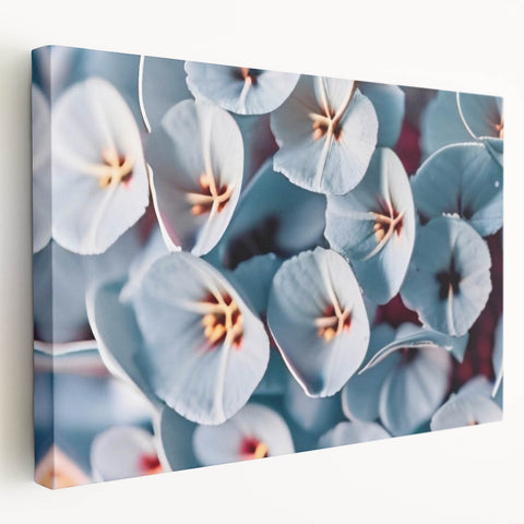 Close-up of floral imagery in soft pastel shades on a large stretched canvas, ideal for kitchen wall art.