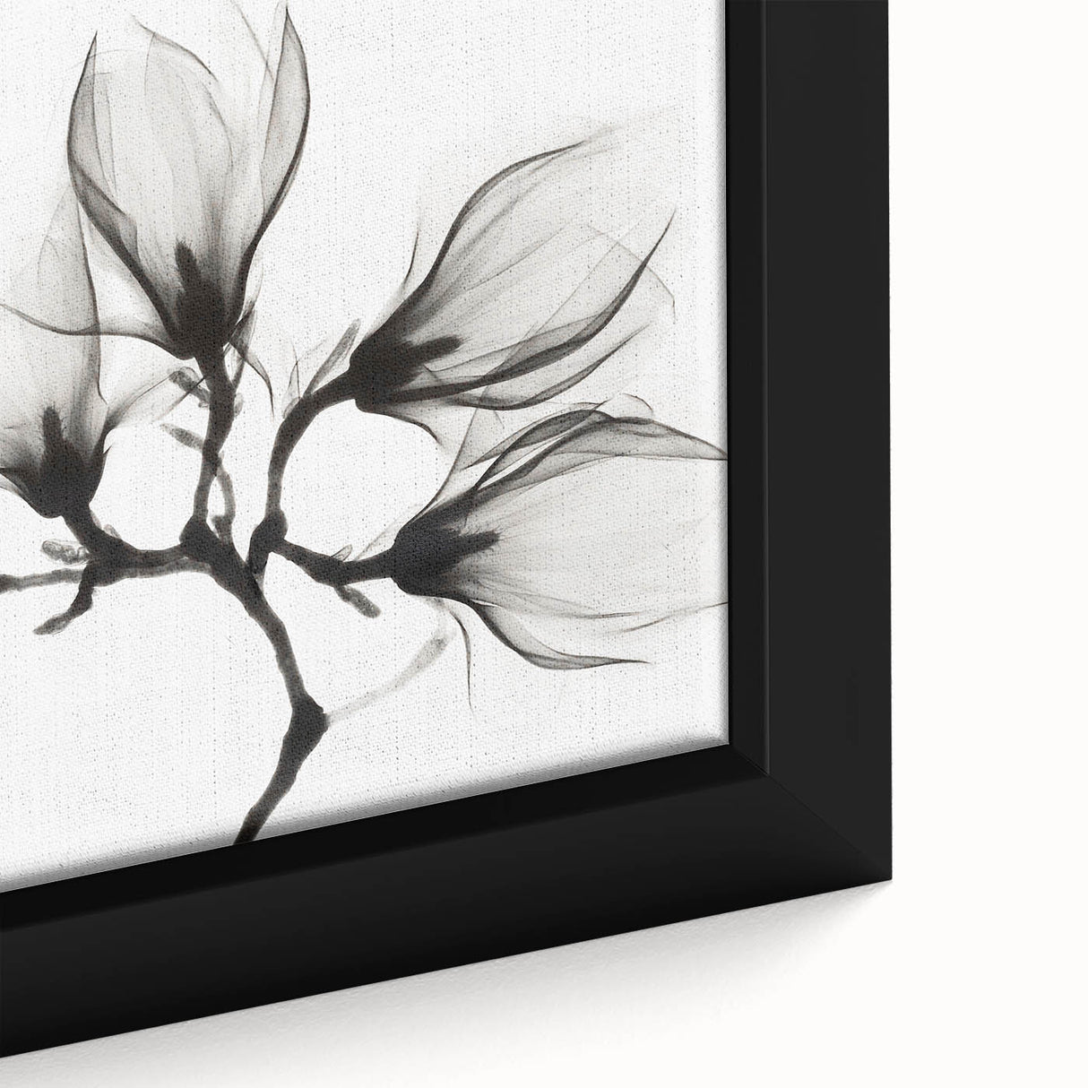 Close-up of black framed canvas featuring a textured floral design in vibrant colors, ideal for living room decor.