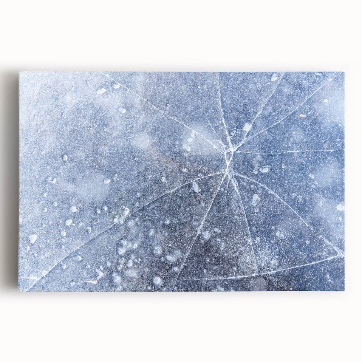 Black and white close-up photo of frost patterns on ice, printed on large stretched canvas, ideal for kitchen wall art.