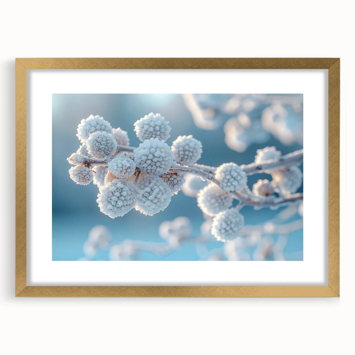 Textured art depicting abstract frost patterns in muted white and blue tones, framed in gold, suitable for bedroom decor.