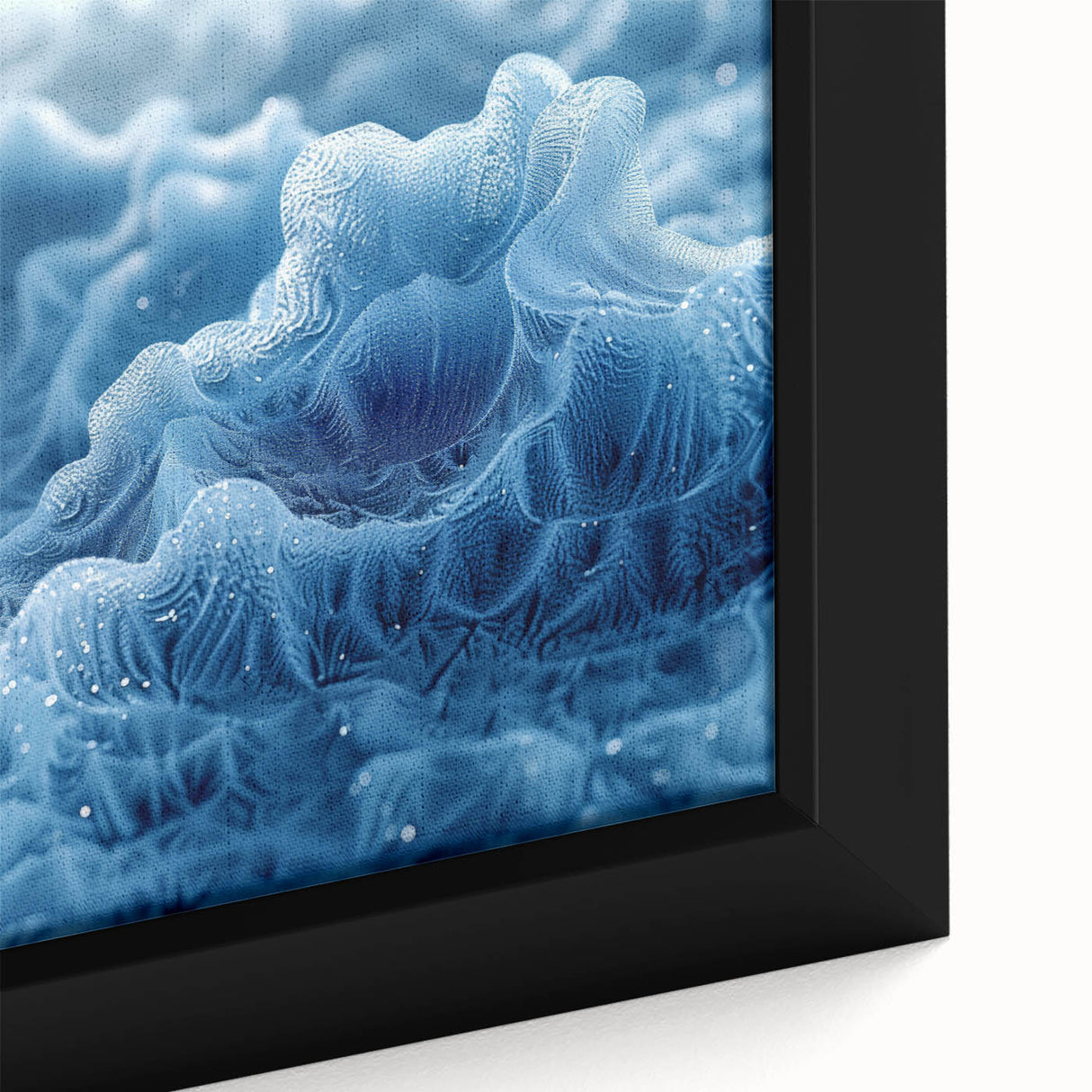 Close-up of textured black wall art depicting frost patterns, framed canvas, suitable for living room decor.