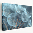 Close-up image of frost patterns on a stretched canvas, featuring intricate blues and whites, suitable for kitchen wall art.