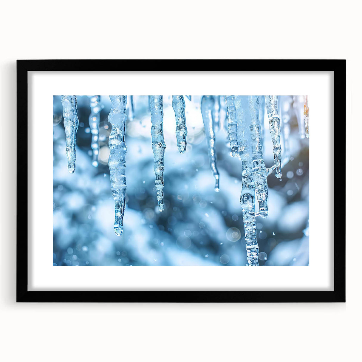 A close-up abstract art print featuring textured frost patterns in vibrant blue and white tones, framed with a black mat.