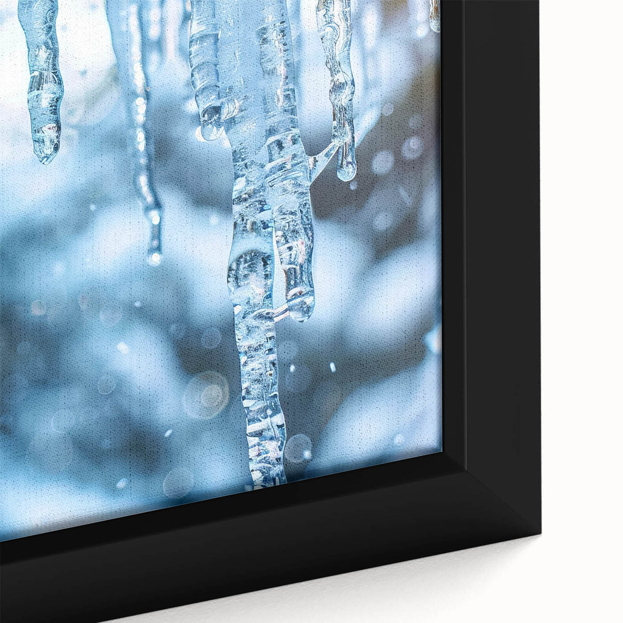 Close-up of textured black wall art depicting frost designs on canvas, ideal for a modern living room ambiance.