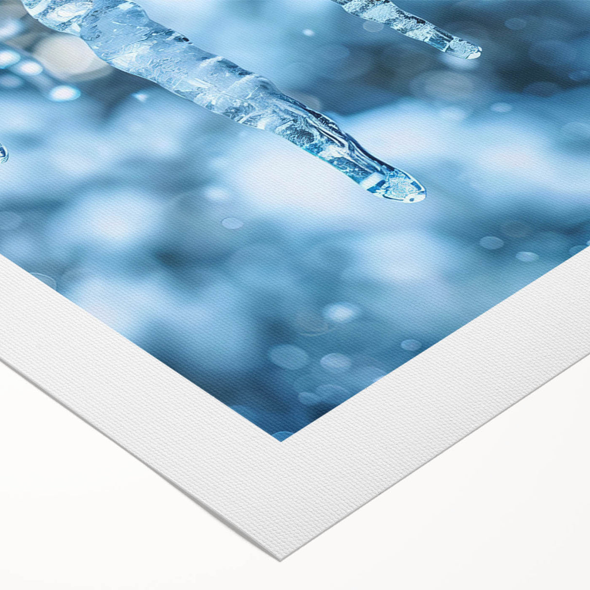 Art deco poster featuring a close-up of frost patterns in muted blue and white tones on rolled canvas.