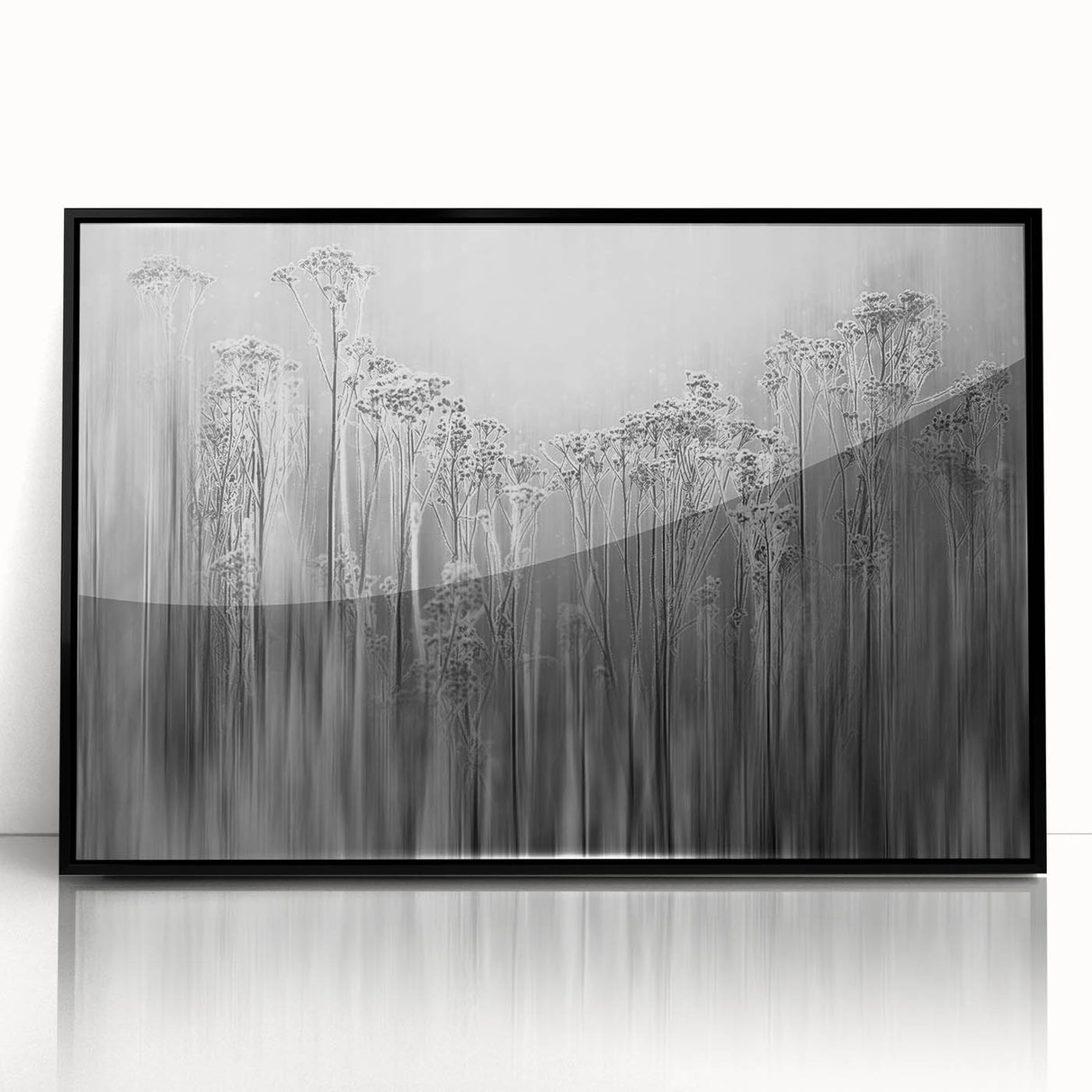 Large abstract wall art depicting frost patterns in muted gray tones, framed in black acrylic.