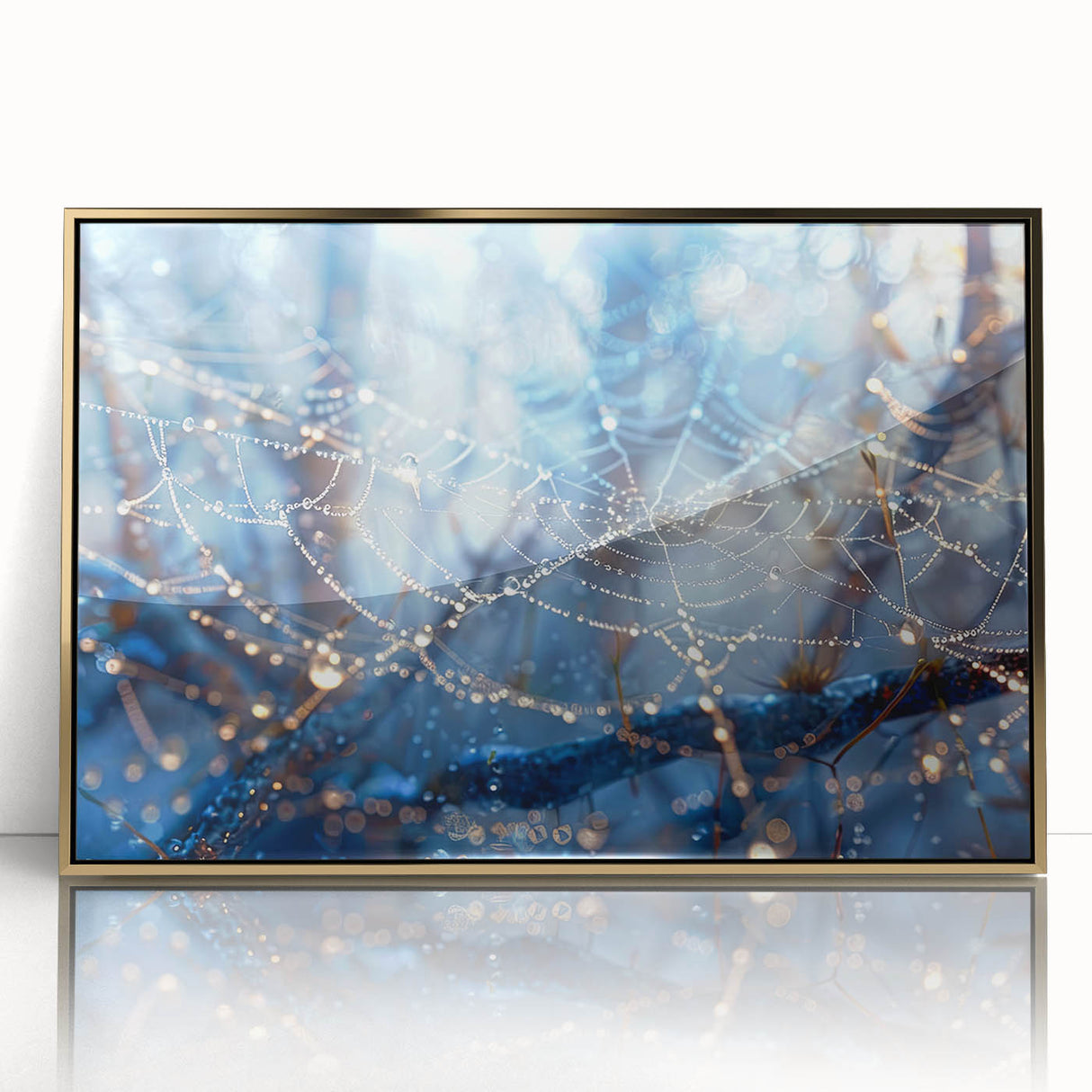 Close-up of water ripples in muted blue and gray tones, framed in gold acrylic, suitable for modern art wall decor.