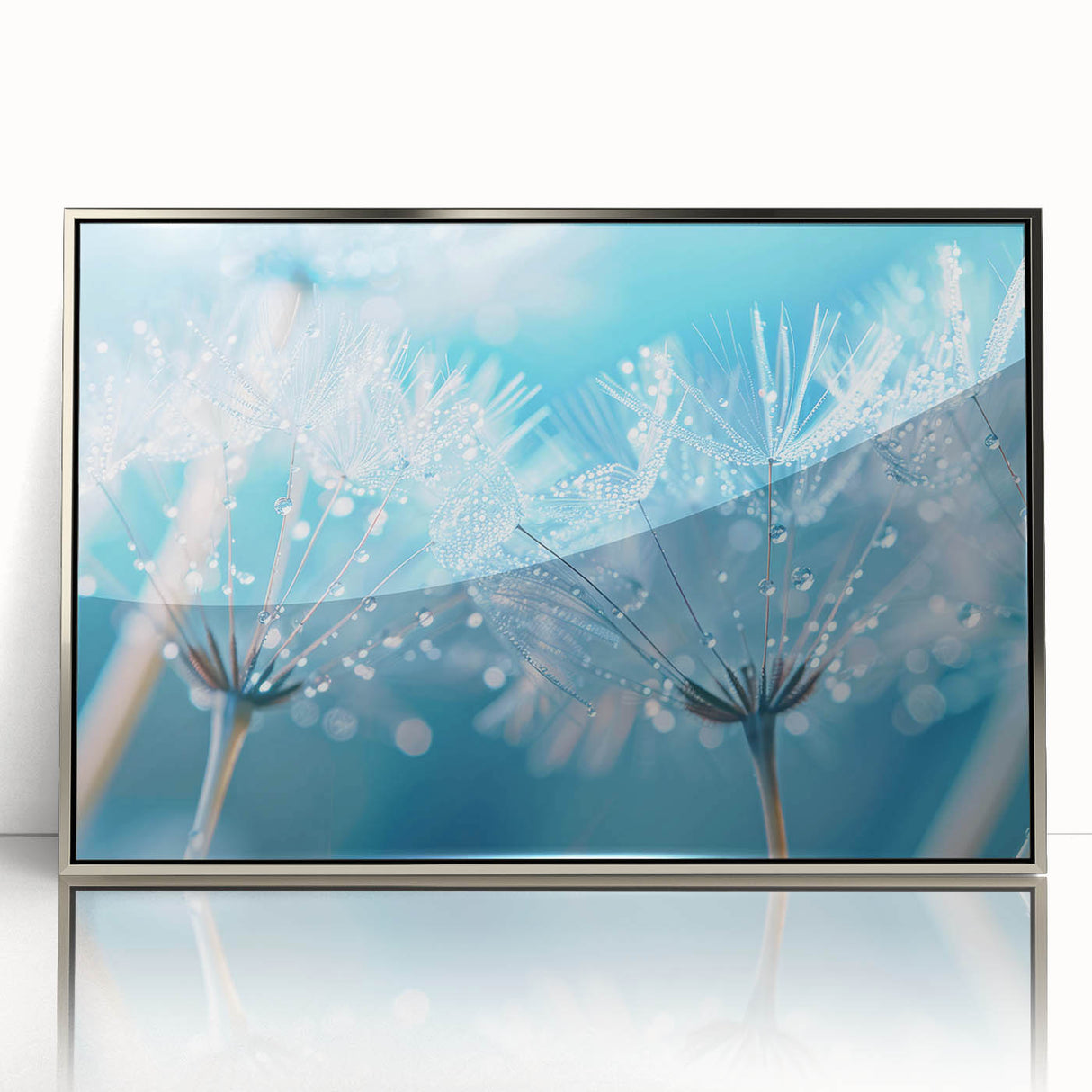 Mid-century modernist art of a close-up water design in silver framed acrylic, with cool blue tones.