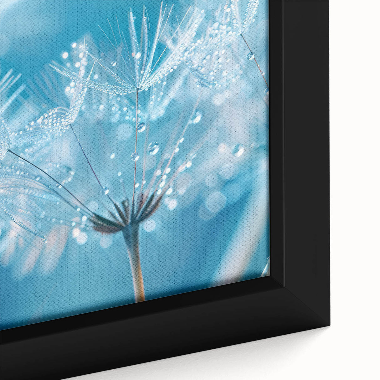 Close-up of textured black wall art featuring vibrant water droplets, on a framed canvas, ideal for living room decor.