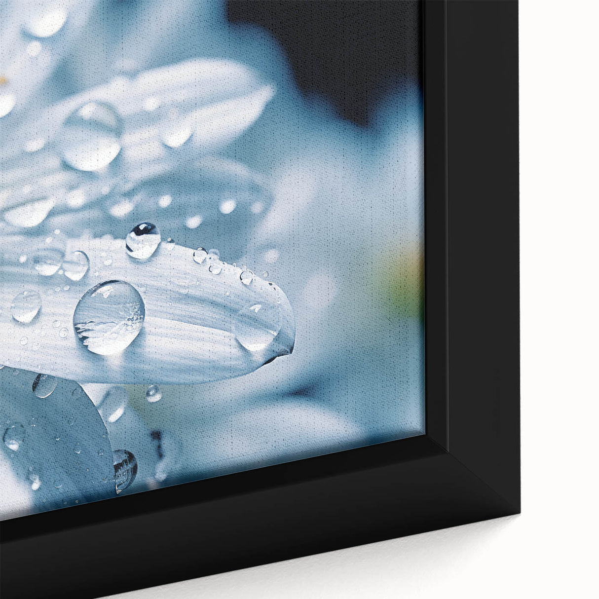 Close-up of textured black wall art featuring colorful, abstract water design on a framed canvas.