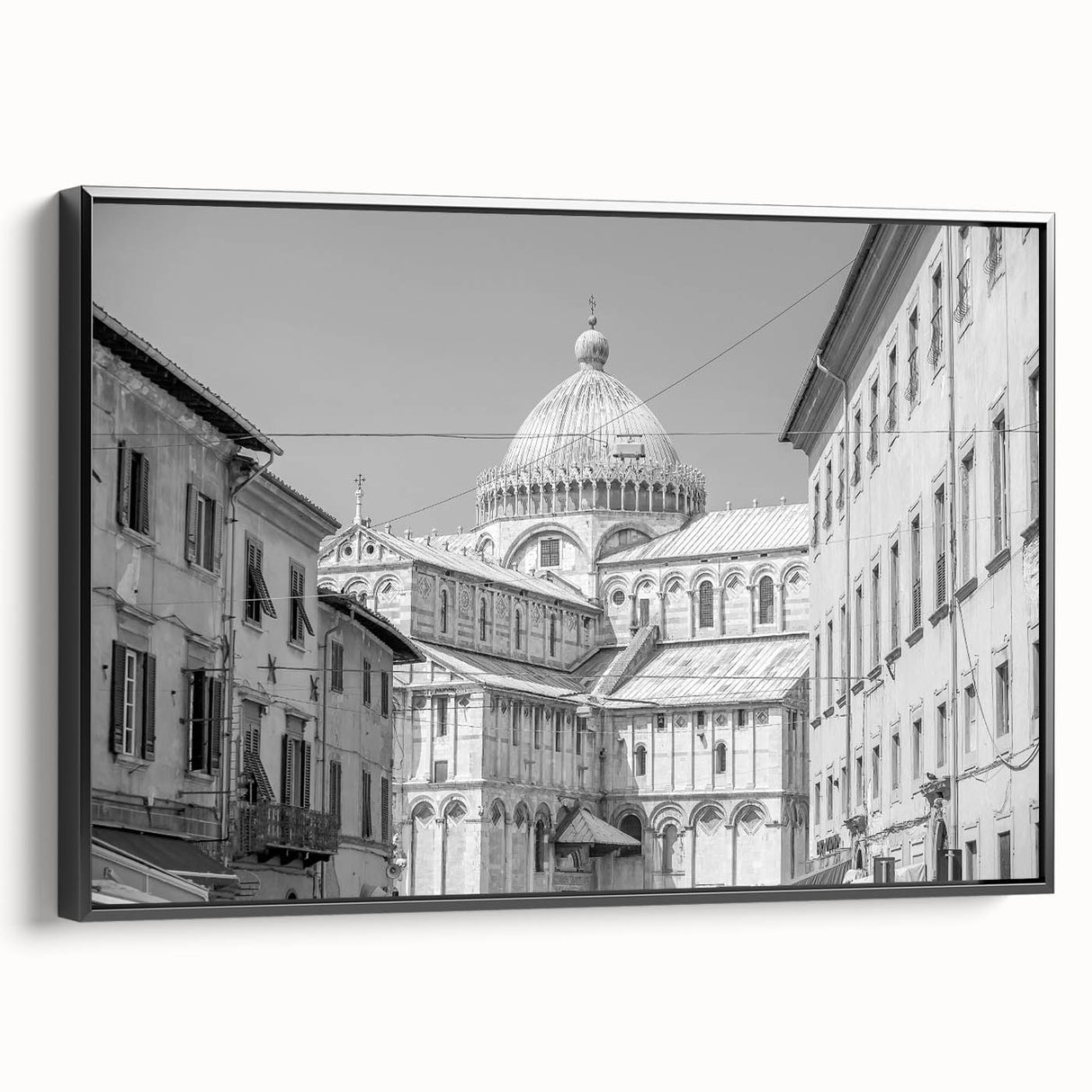 Framed canvas featuring a black and white vintage poster of a cathedral, ideal for bedroom wall art.