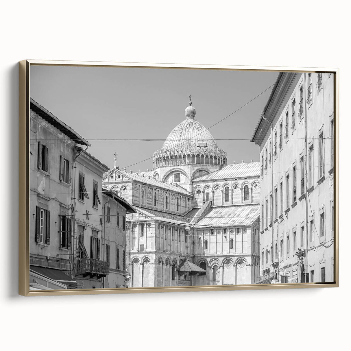 Framed canvas featuring a vintage poster art of a cathedral in a colorful landscape.