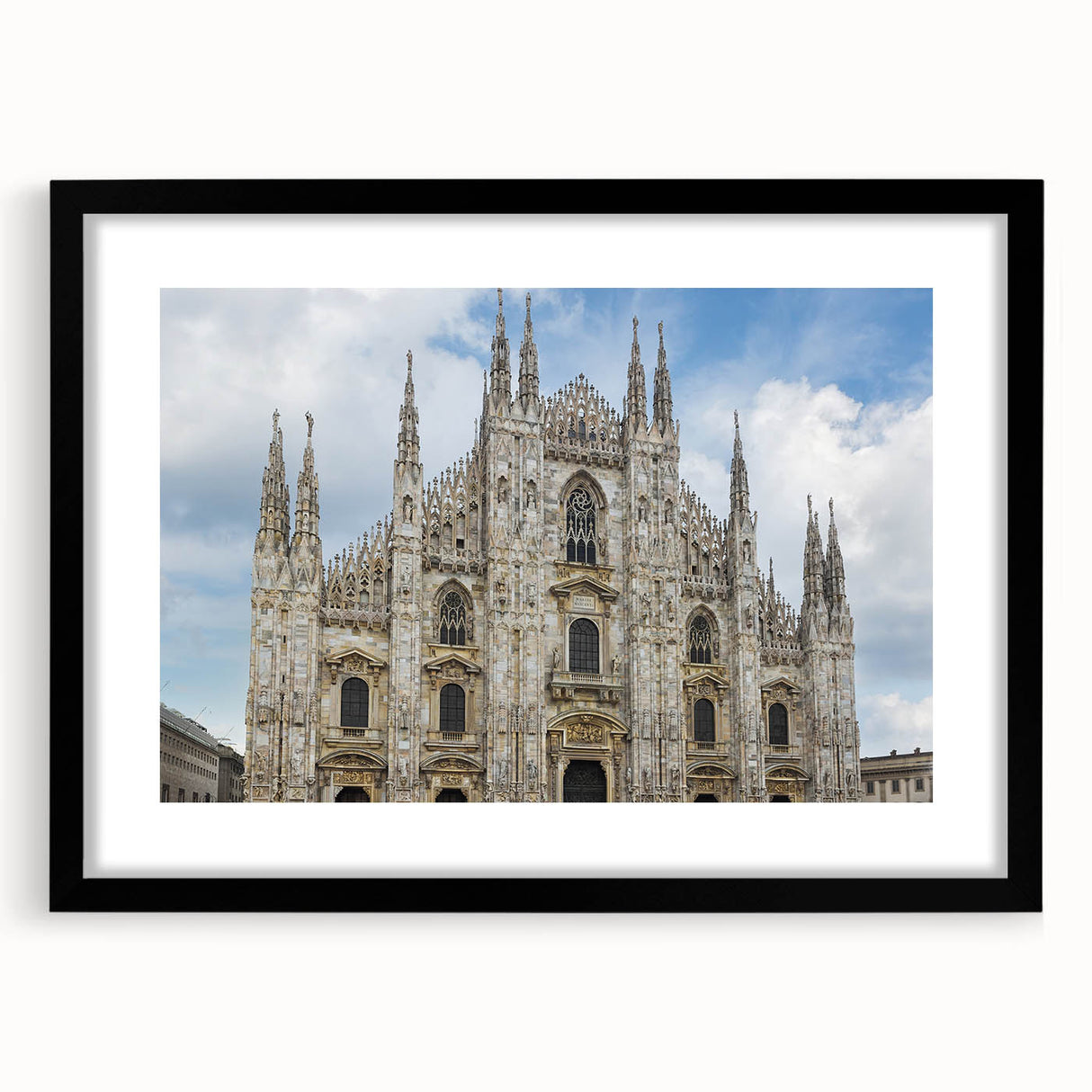 Abstract art print of a cathedral, featuring vibrant, colorful textures on a large black framed canvas.