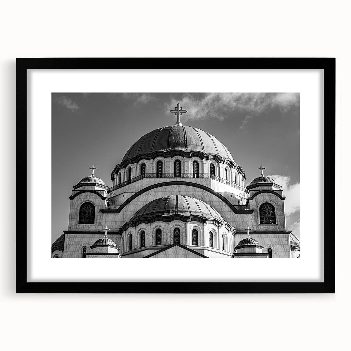 Extra large abstract art print of a colorful, textured cathedral design on a black framed canvas.