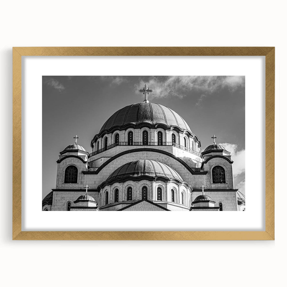 Textured abstract art print of a cathedral, in muted gold and beige tones on a framed canvas, suitable for bedroom decor.