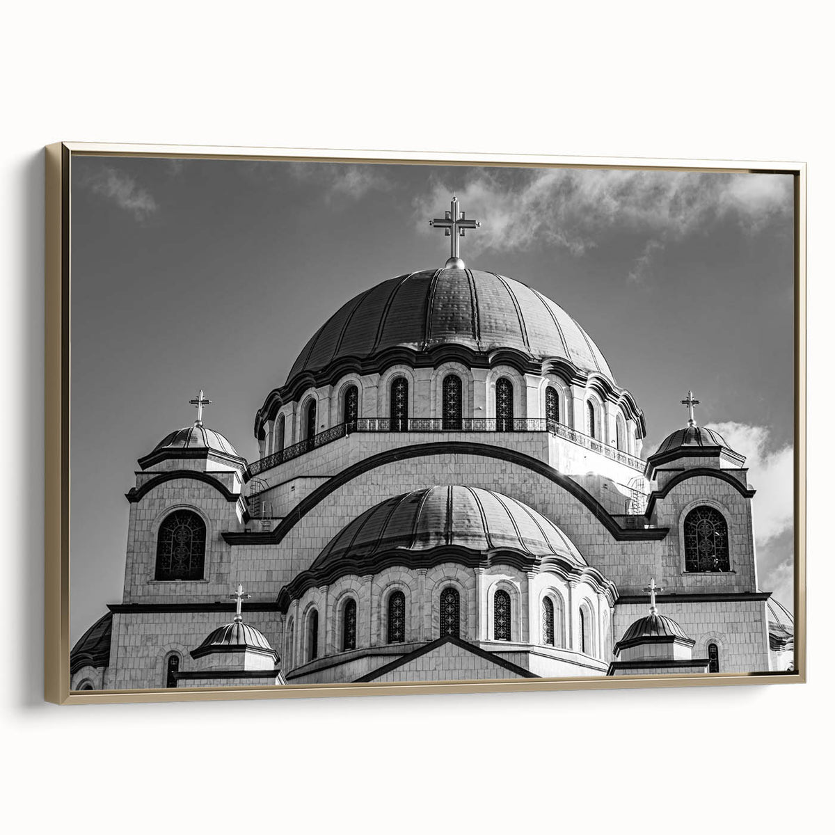 Framed canvas of a vintage cathedral landscape painting in muted gold and black tones, ideal for living room decor.