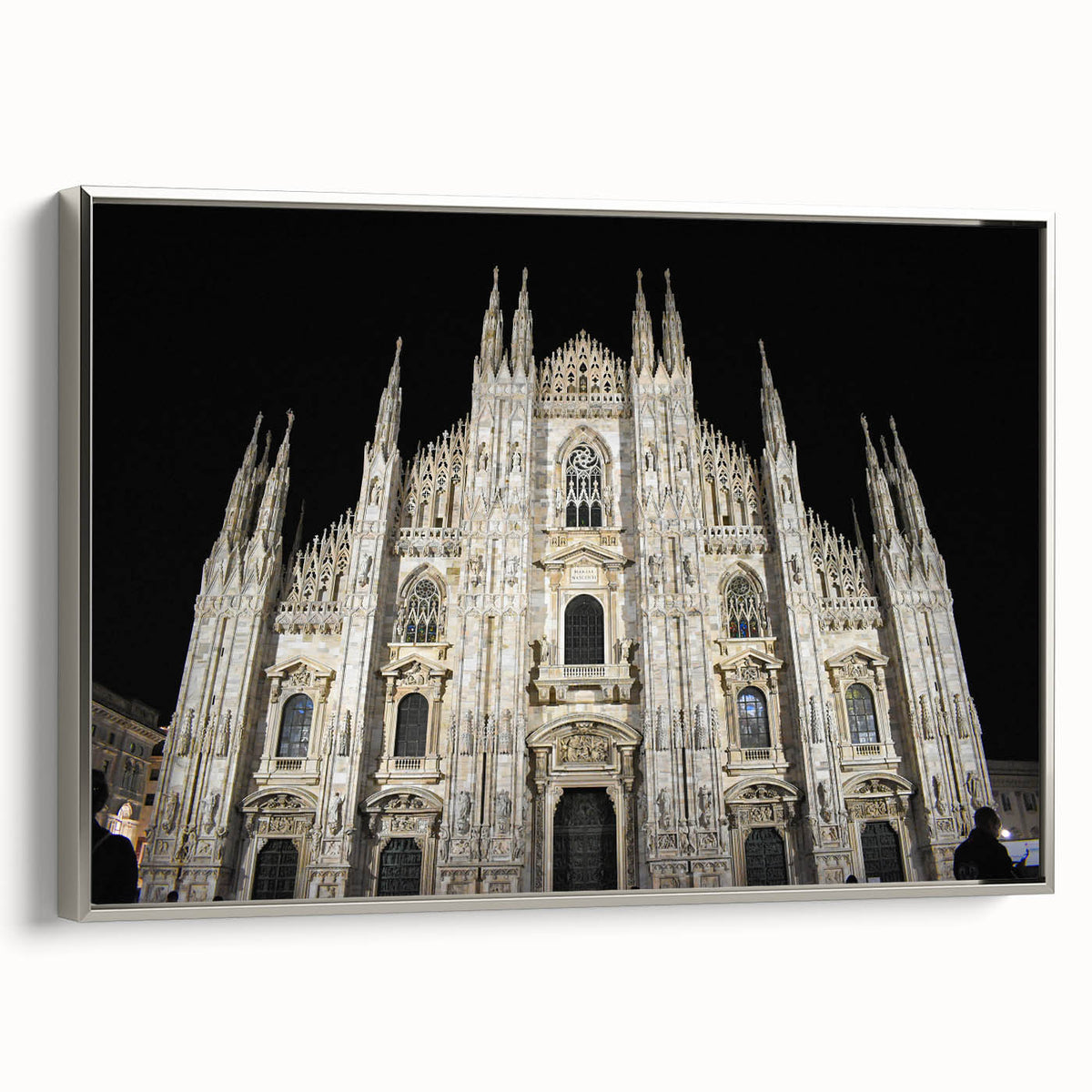 Vintage poster art of a cathedral, in colorful hues on a black background, presented as a framed canvas.