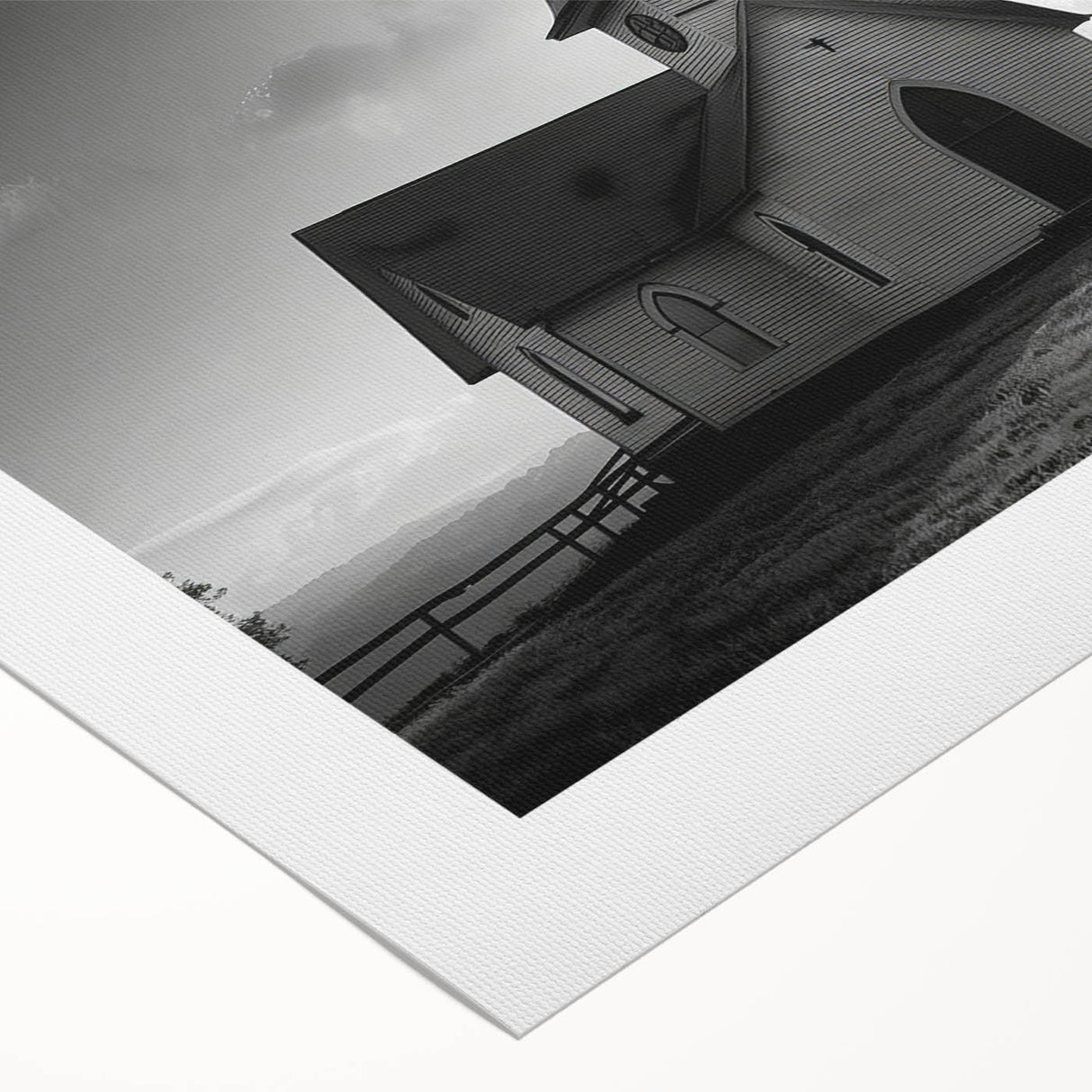 Art deco poster featuring a geometric church design in muted gold and black on rolled canvas.