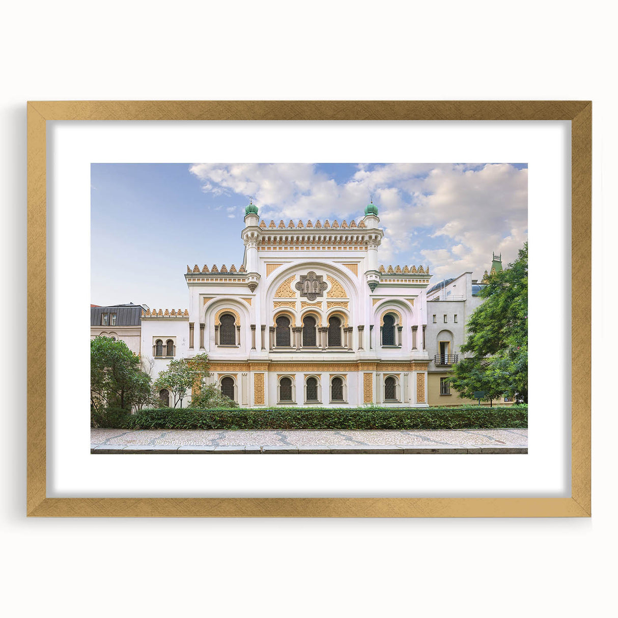 Textured abstract art print of a synagogue in muted gold and beige tones, framed with a gold mat, ideal for bedroom art.
