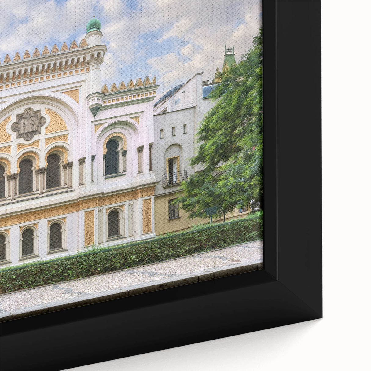 Black wall art featuring a textured, colorful synagogue design on a framed canvas, ideal for living room decor.