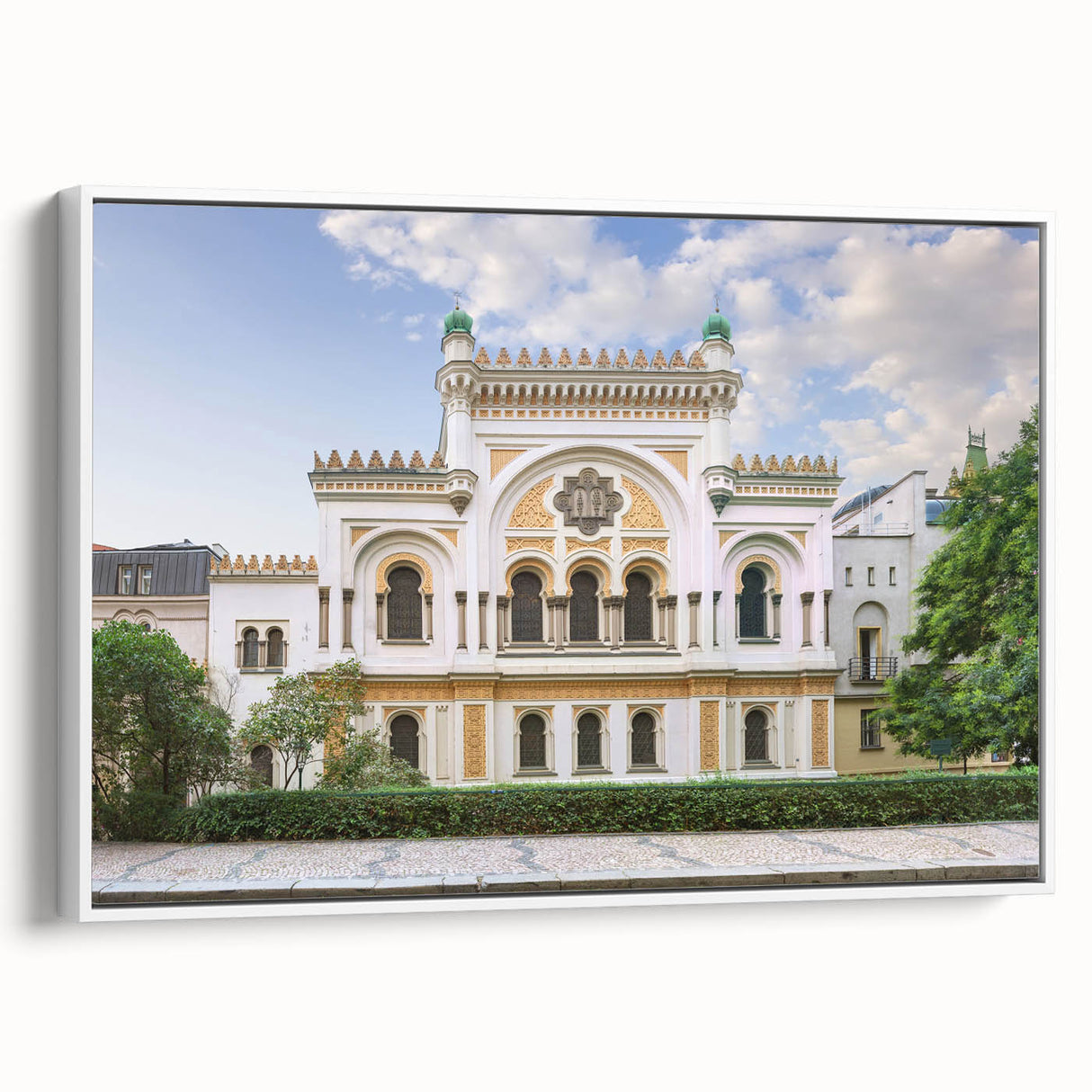 Framed canvas featuring a vintage poster of a synagogue in a landscape setting, with muted earth tones.