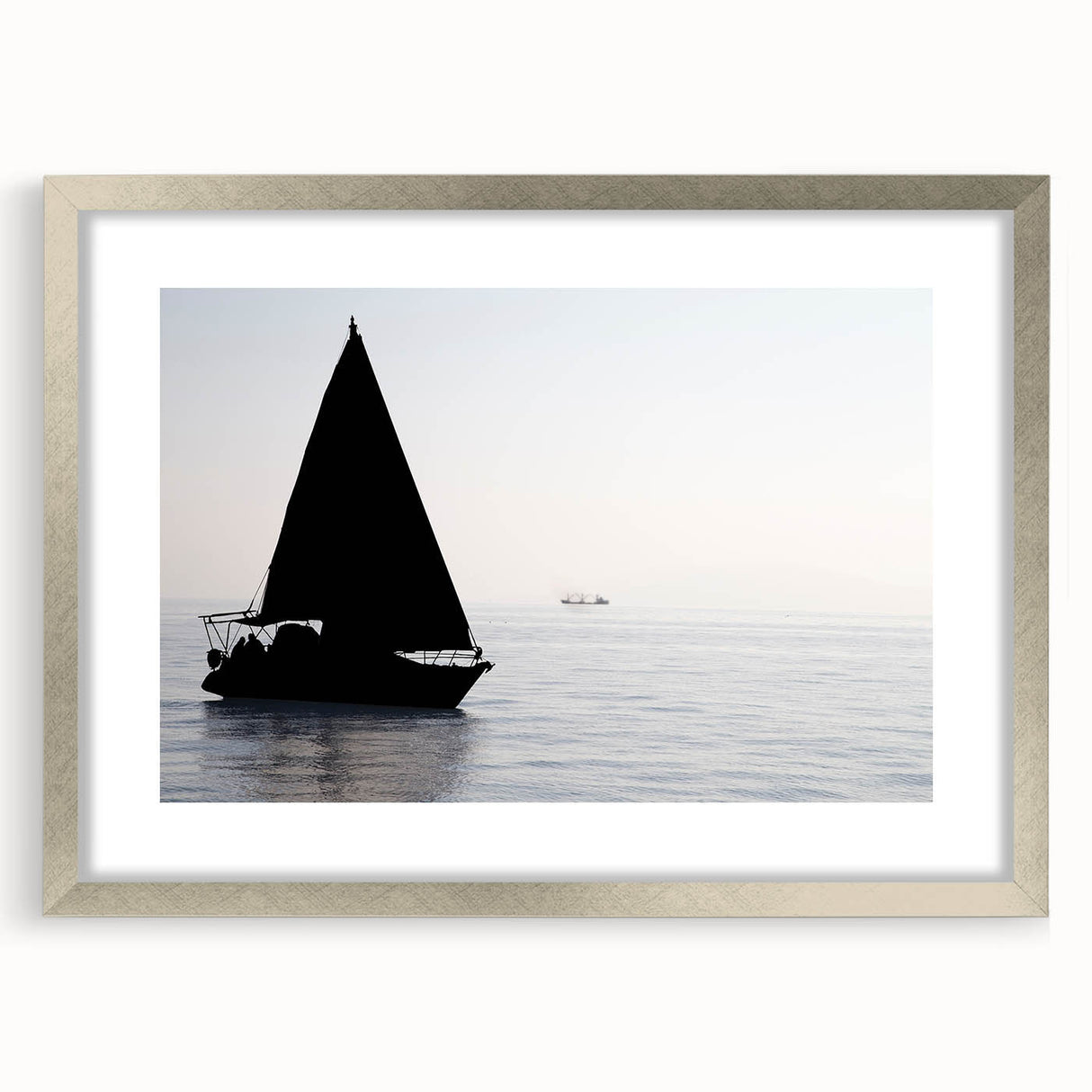 Abstract art print of a stylized sailboat in cool blue tones on a silver-framed canvas, ideal for dining room decor.
