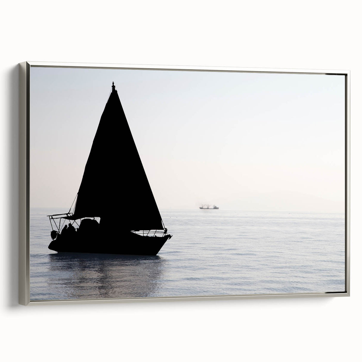 Vintage poster art of a sailboat, rendered in colorful art on a black background, framed in silver.