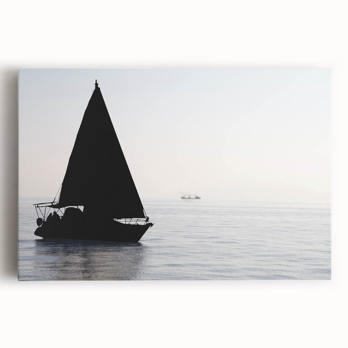 Black and white photo of a sailboat on a calm sea, printed on large stretched canvas, ideal for kitchen wall art.