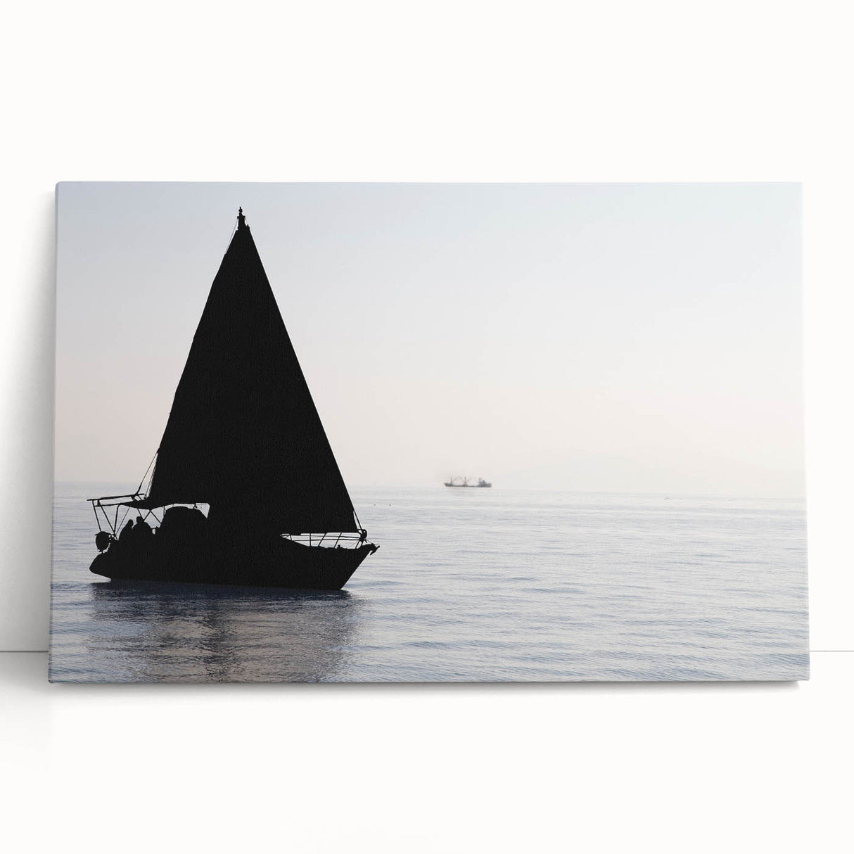 Black and white photo of a sailboat on stretched canvas, ideal for kitchen wall art or bedroom ambiance.