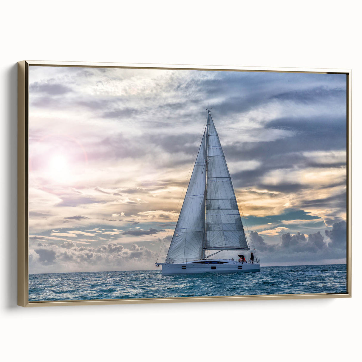 Framed canvas of a vintage sailboat on a colorful sea, ideal for nautical-themed decor.
