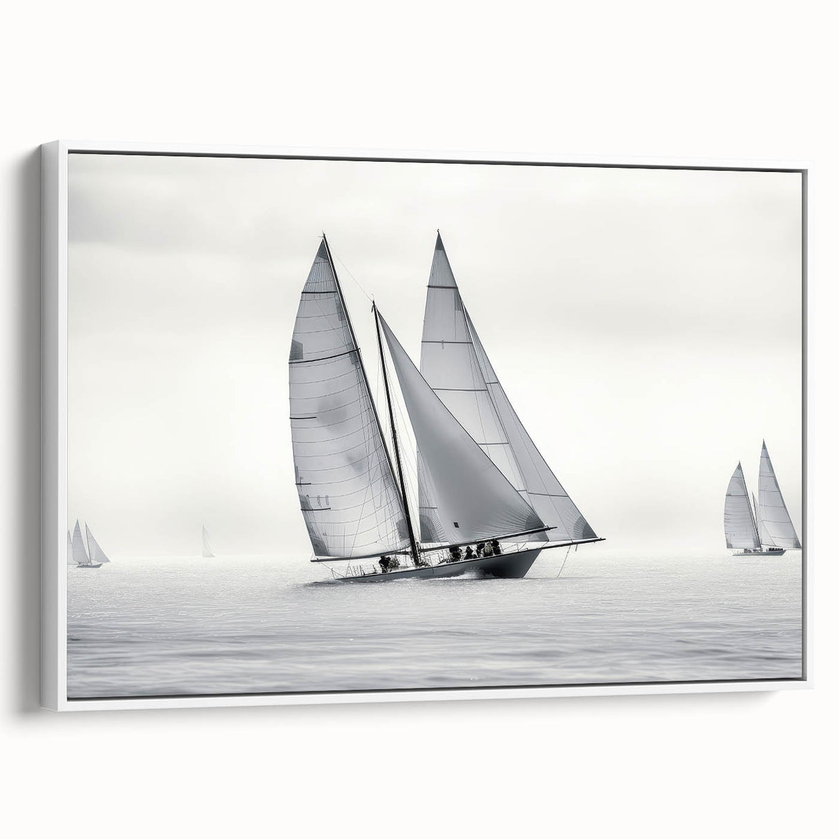 Sailboat on a calm sea depicted in muted gray and black tones on a framed canvas, ideal for bedroom wall art.