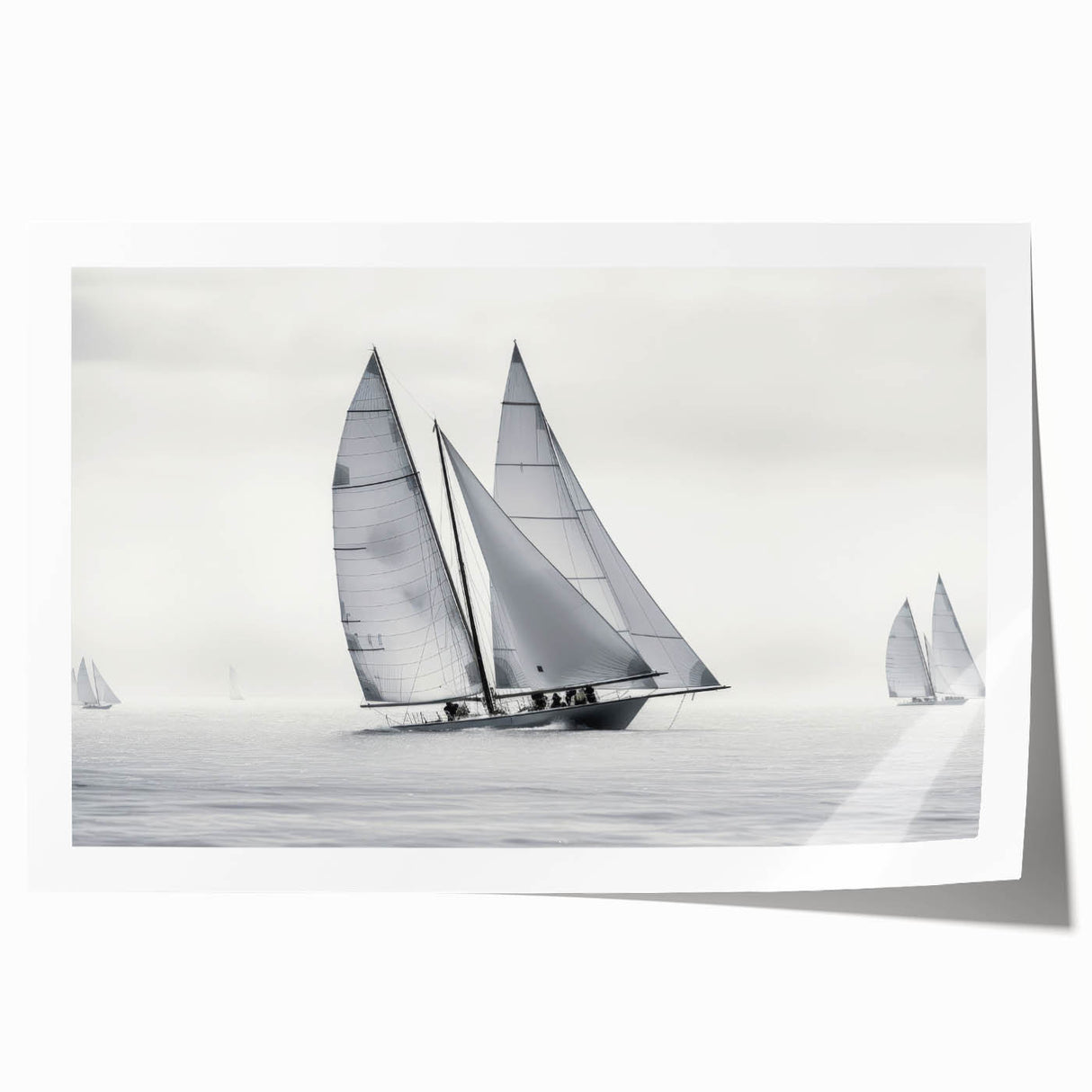 Rolled print of a sailboat on calm waters in muted blue tones, suitable as art wall for dining rooms.